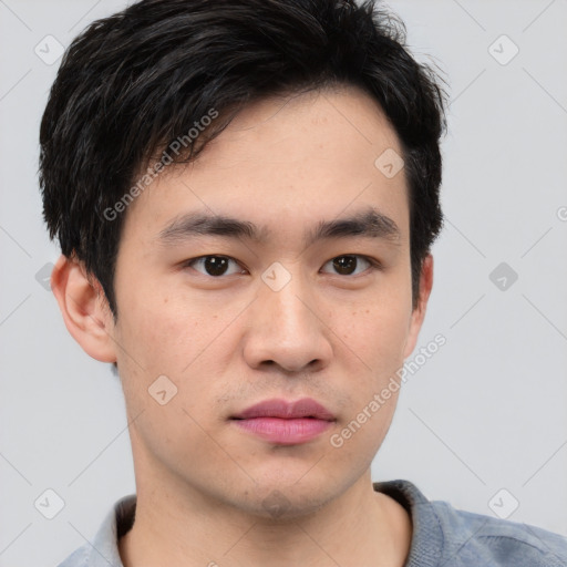 Neutral asian young-adult male with short  brown hair and brown eyes