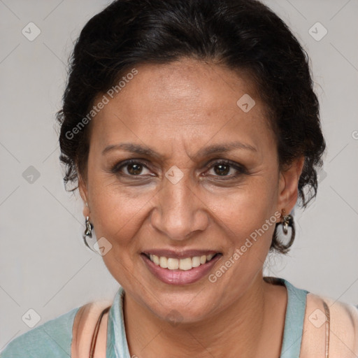 Joyful latino adult female with short  brown hair and brown eyes