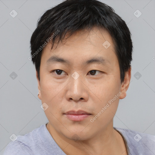 Neutral asian young-adult male with short  black hair and brown eyes