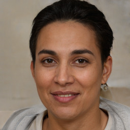 Joyful white adult female with short  brown hair and brown eyes