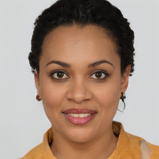 Joyful latino young-adult female with short  brown hair and brown eyes
