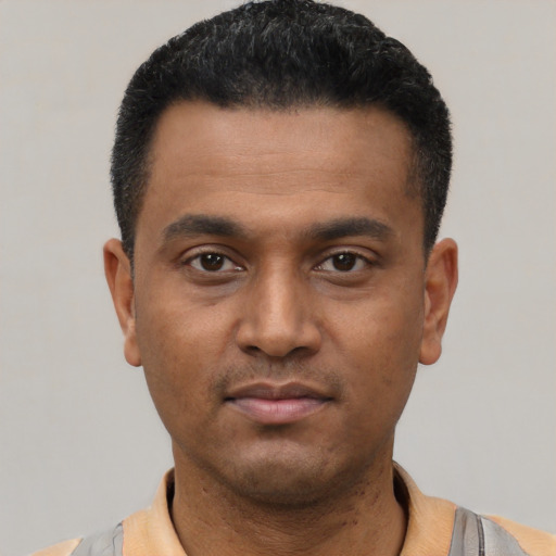 Neutral latino young-adult male with short  black hair and brown eyes