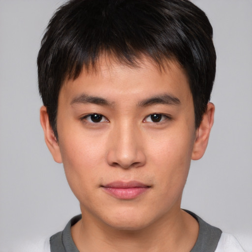 Neutral asian young-adult male with short  brown hair and brown eyes