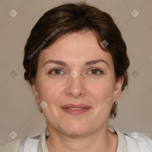 Joyful white adult female with medium  brown hair and blue eyes