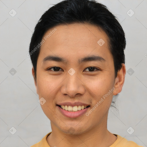 Joyful asian young-adult female with short  brown hair and brown eyes