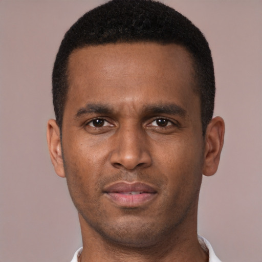 Neutral black young-adult male with short  brown hair and brown eyes
