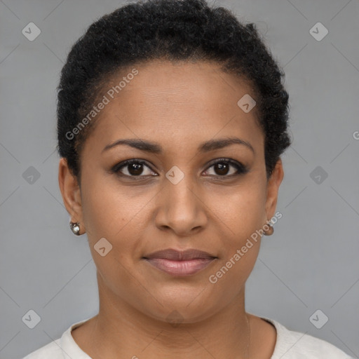 Joyful black young-adult female with short  brown hair and brown eyes