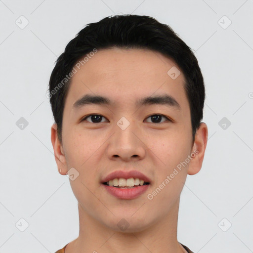 Joyful asian young-adult male with short  black hair and brown eyes