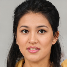 Joyful asian young-adult female with medium  brown hair and brown eyes