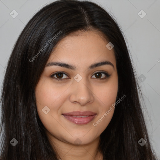 Joyful latino young-adult female with long  brown hair and brown eyes