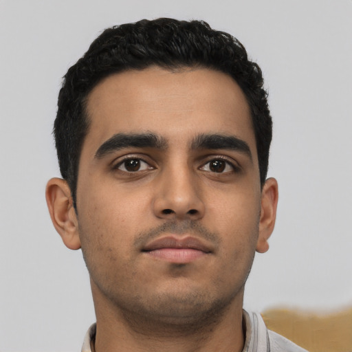 Neutral latino young-adult male with short  black hair and brown eyes