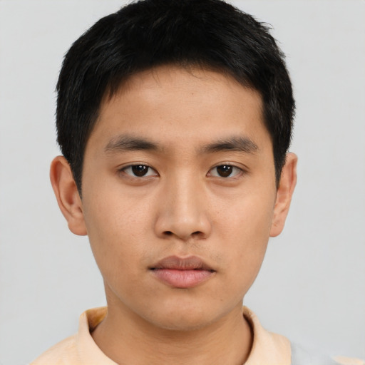 Neutral asian young-adult male with short  brown hair and brown eyes