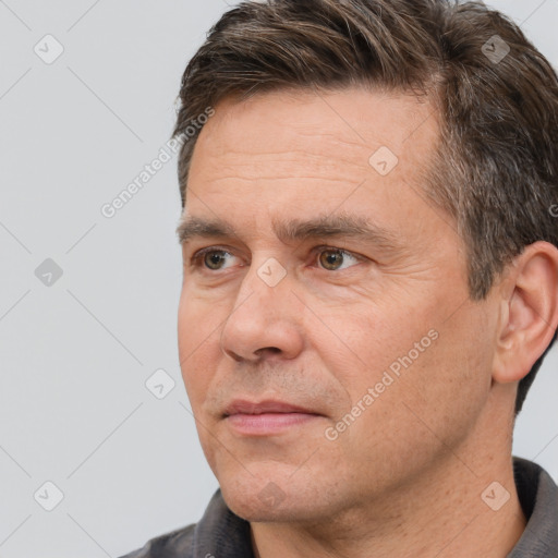 Neutral white adult male with short  brown hair and brown eyes