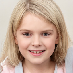 Joyful white child female with medium  brown hair and grey eyes