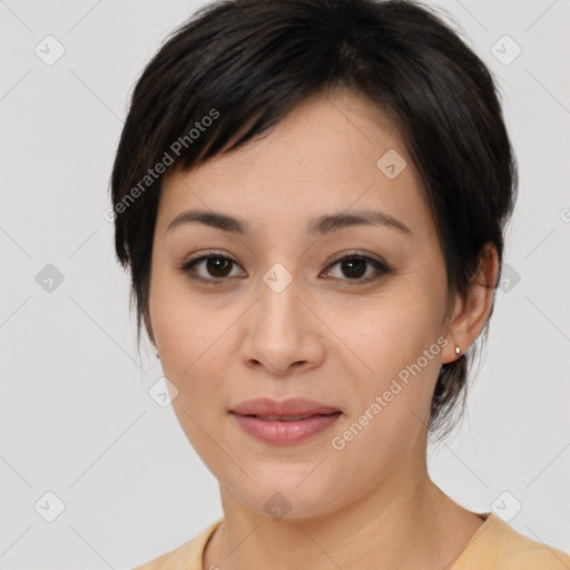 Joyful asian young-adult female with medium  brown hair and brown eyes