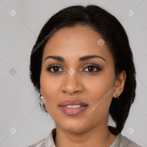 Joyful latino young-adult female with medium  brown hair and brown eyes