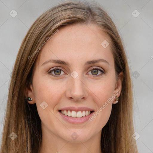 Joyful white young-adult female with long  brown hair and green eyes