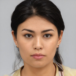 Neutral asian young-adult female with medium  brown hair and brown eyes