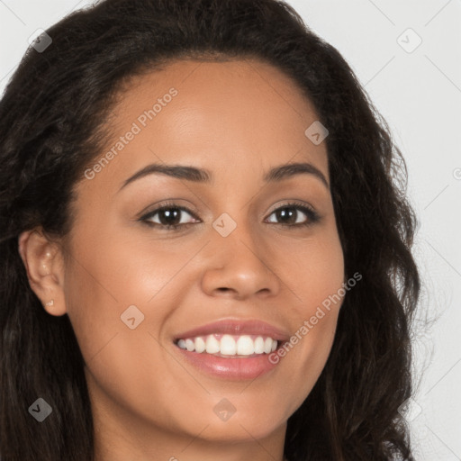 Joyful latino young-adult female with long  brown hair and brown eyes