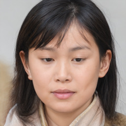 Neutral asian young-adult female with medium  brown hair and brown eyes