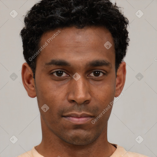 Neutral black young-adult male with short  brown hair and brown eyes