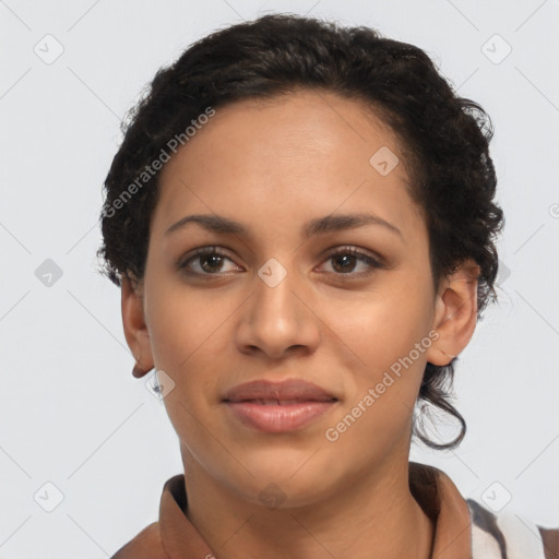 Joyful latino young-adult female with short  brown hair and brown eyes