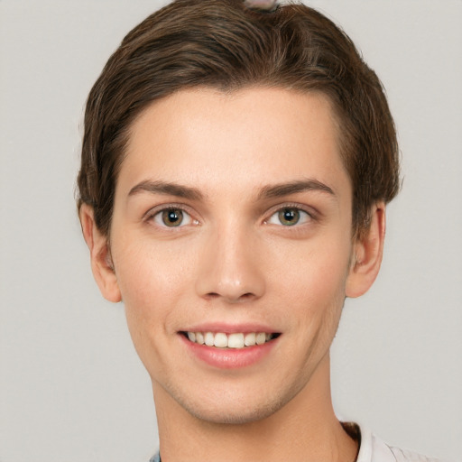 Joyful white young-adult female with short  brown hair and grey eyes