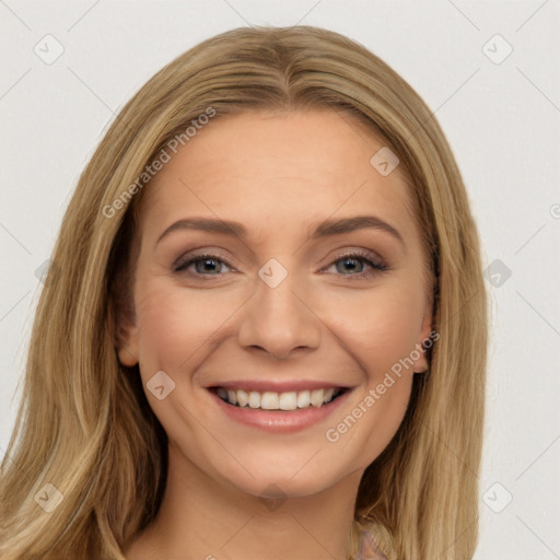 Joyful white young-adult female with long  brown hair and brown eyes