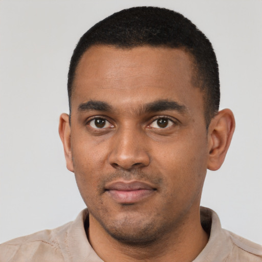 Neutral black young-adult male with short  black hair and brown eyes