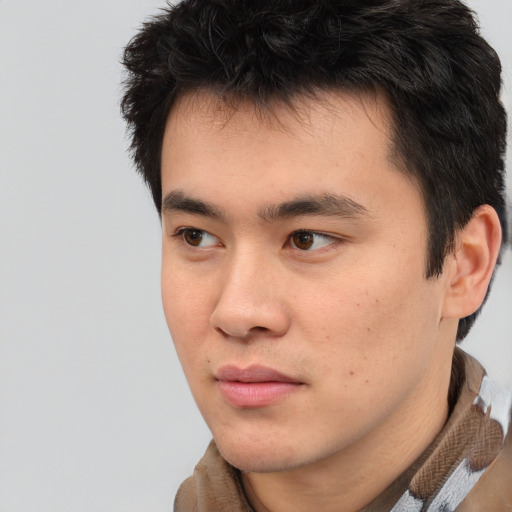 Neutral asian young-adult male with short  brown hair and brown eyes