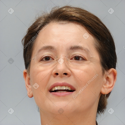 Joyful white adult female with short  brown hair and brown eyes