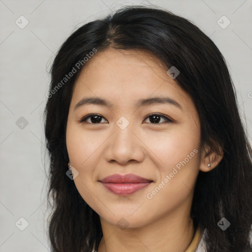 Joyful latino young-adult female with long  brown hair and brown eyes