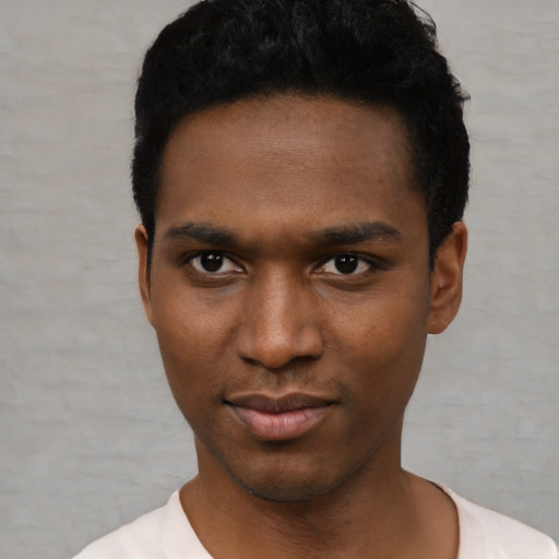 Neutral black young-adult male with short  black hair and brown eyes