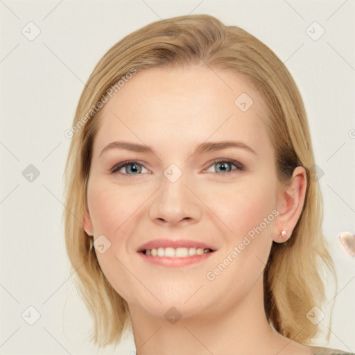 Joyful white young-adult female with medium  brown hair and blue eyes