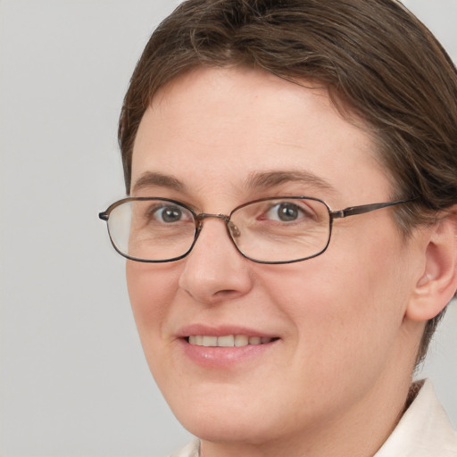 Joyful white adult female with short  brown hair and brown eyes