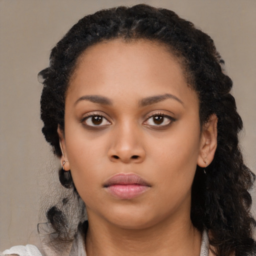 Neutral black young-adult female with medium  black hair and brown eyes