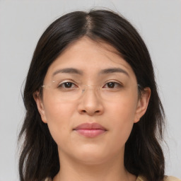 Neutral asian young-adult female with medium  brown hair and brown eyes