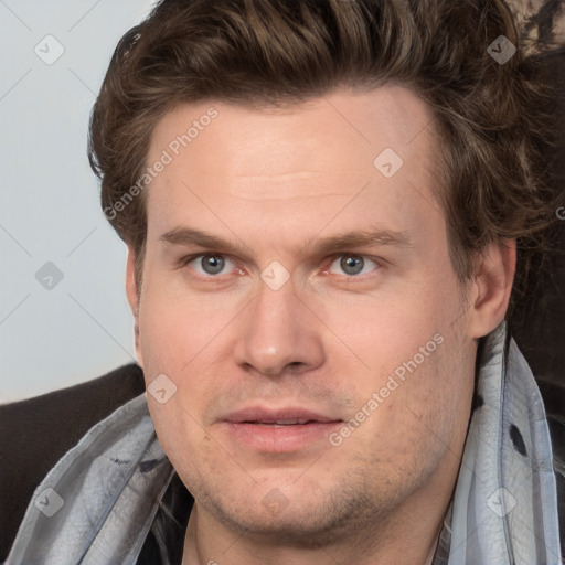 Joyful white adult male with short  brown hair and grey eyes