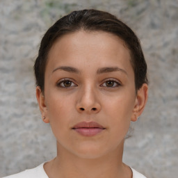 Neutral white young-adult female with short  brown hair and brown eyes