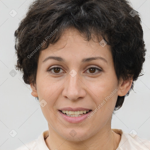 Joyful white adult female with short  brown hair and brown eyes