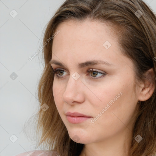 Neutral white young-adult female with long  brown hair and blue eyes