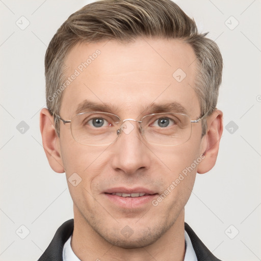 Joyful white adult male with short  brown hair and grey eyes