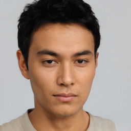 Neutral asian young-adult male with short  brown hair and brown eyes