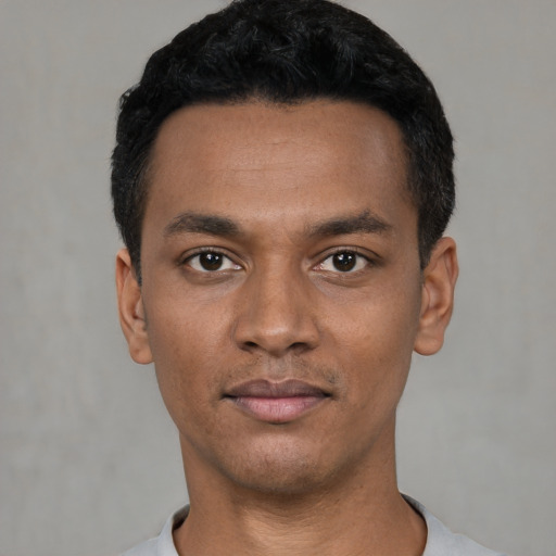 Neutral latino young-adult male with short  black hair and brown eyes