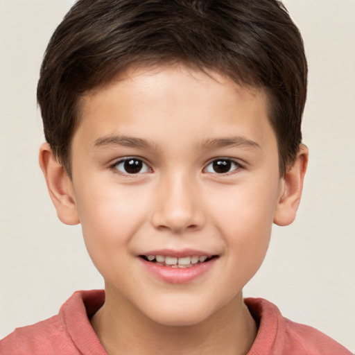 Joyful white child male with short  brown hair and brown eyes