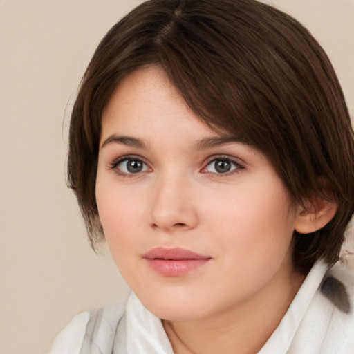 Neutral white young-adult female with medium  brown hair and brown eyes