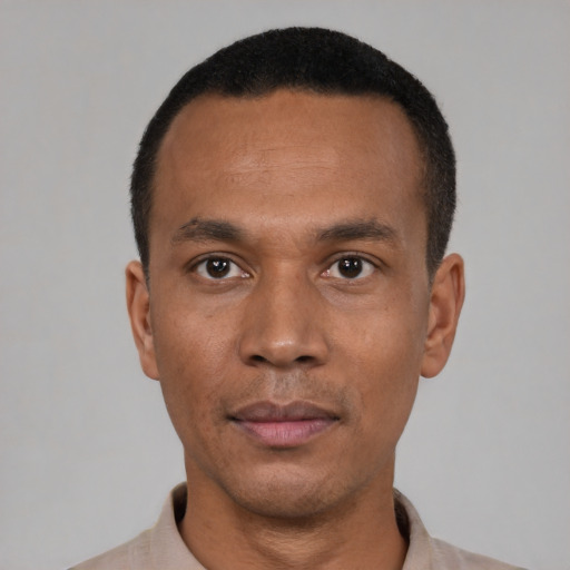 Neutral black young-adult male with short  black hair and brown eyes