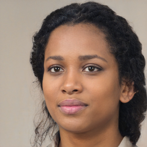 Neutral black young-adult female with long  black hair and brown eyes