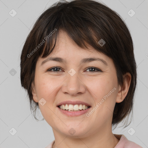 Joyful white young-adult female with medium  brown hair and brown eyes