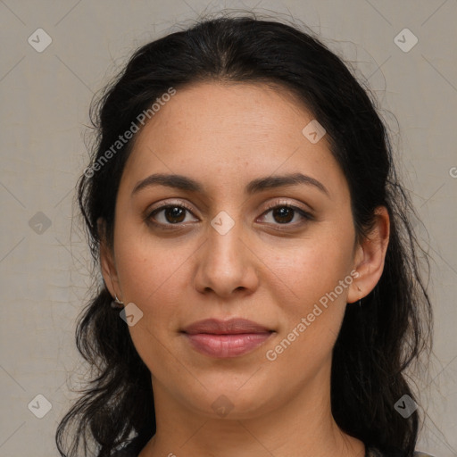 Joyful latino young-adult female with medium  brown hair and brown eyes